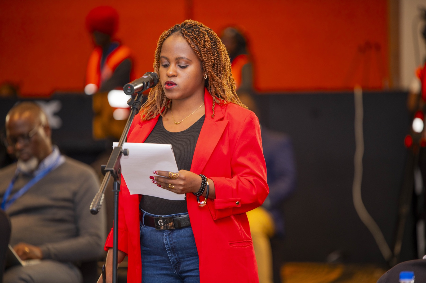Rexa Mphuwa sharing operational insights at the AFRINIC-37 floor microphone